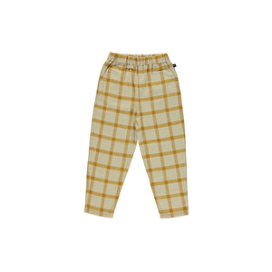 Mustard check trousers. Made with 100% organic cotton. It has an elastic waistband. Made by Monkind