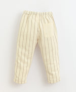Load image into Gallery viewer, Baige trousers made of a mixture of woven and organic cotton. It has an elastic waist with an adjustable linen cord and one rear pocket. Made by Play Up.

