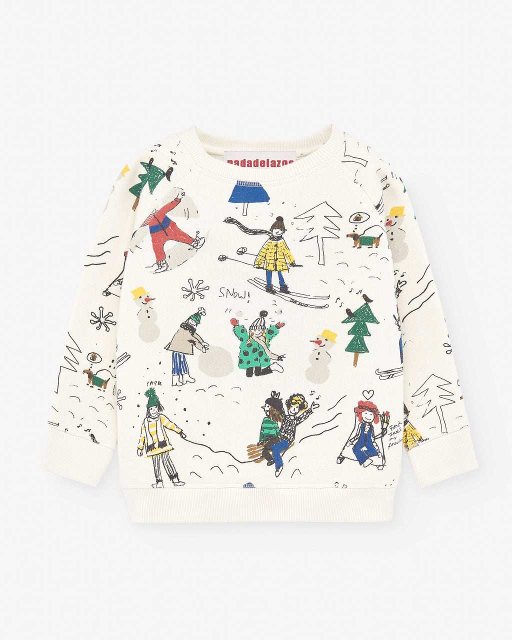 White jumper with various prints of kids skiing. Comes with ribbed cuffs and brushed cotton from the inside for extra warmth. Made by Nadadelazos