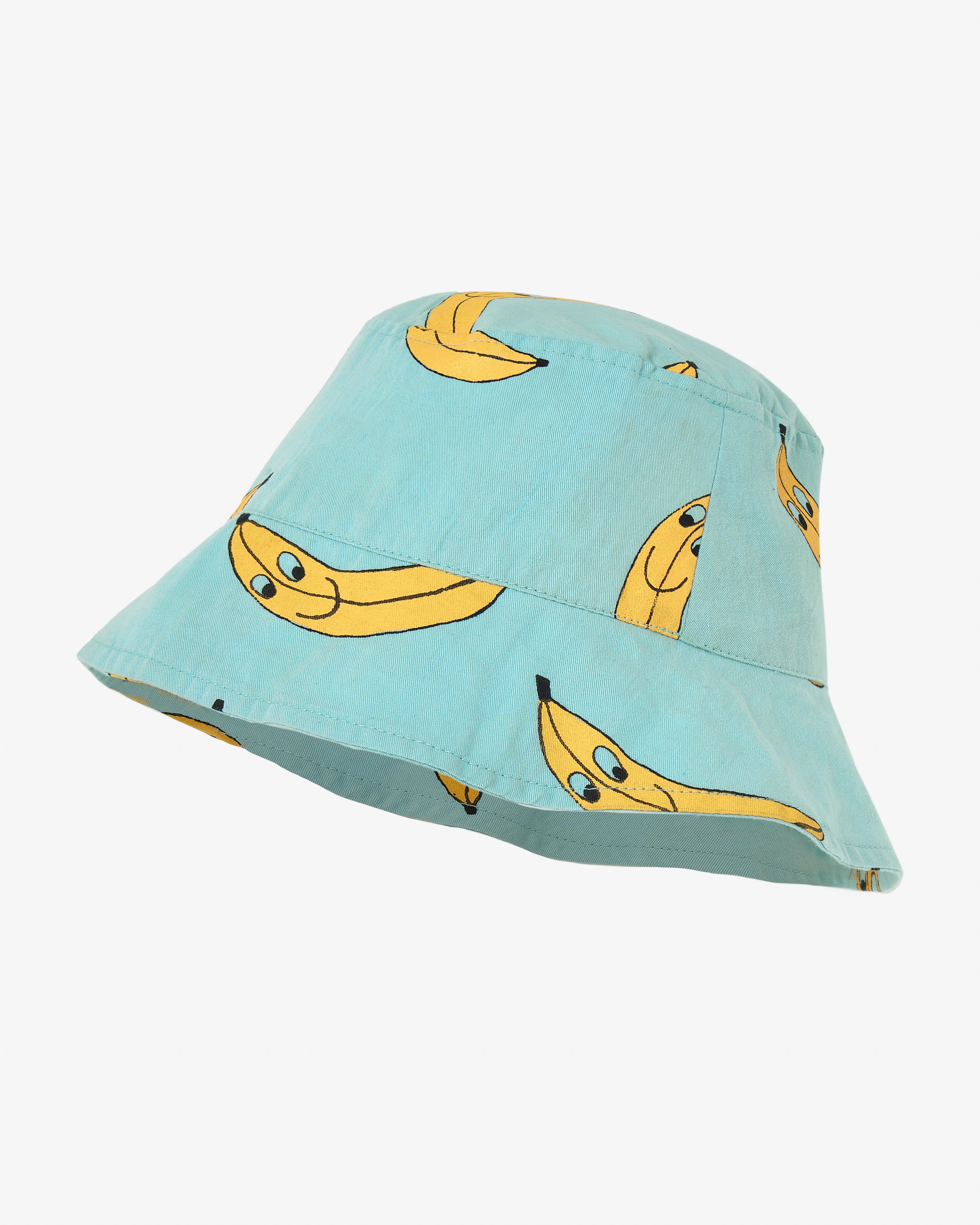 Bucket style hat in light green with yellow banana print. Made by Nadadelazos.