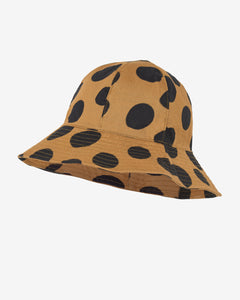 Brown hat with a large black polka dots all-over print. Made by Nadadelazos