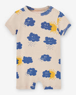 Load image into Gallery viewer, Light cream romper with blue clouds and yellow sun print. It comes with a shoulder opening. Made by Nadadelazos
